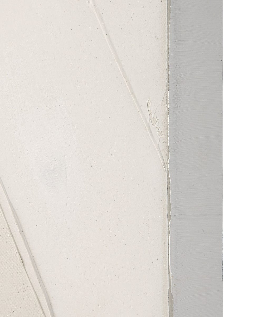 The wrapped edge of a gallery wrap canvas