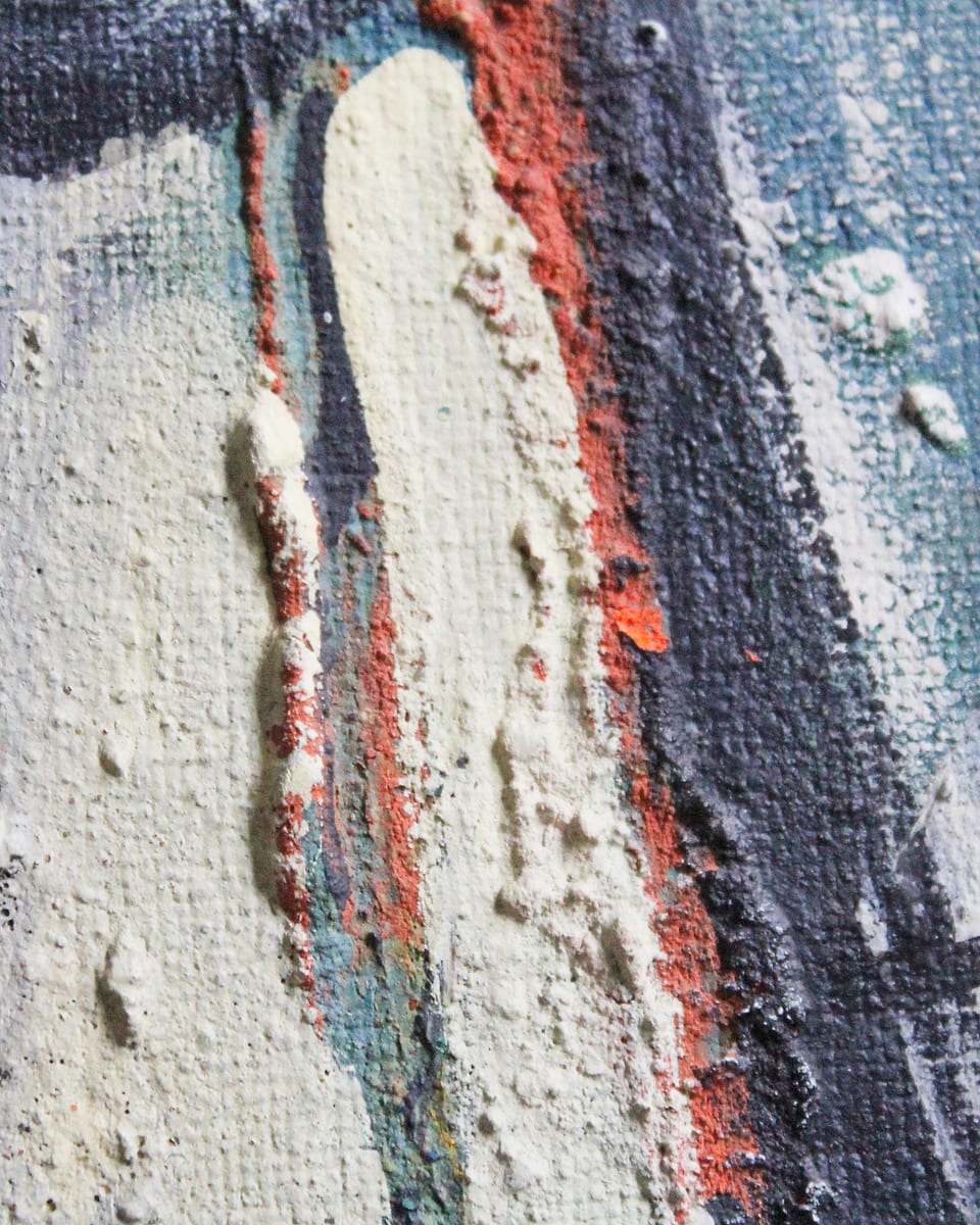 Heavy texture on a canvas, with raised paint and the weave showing